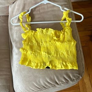 Yellow crop tank top. Size small. Never worn